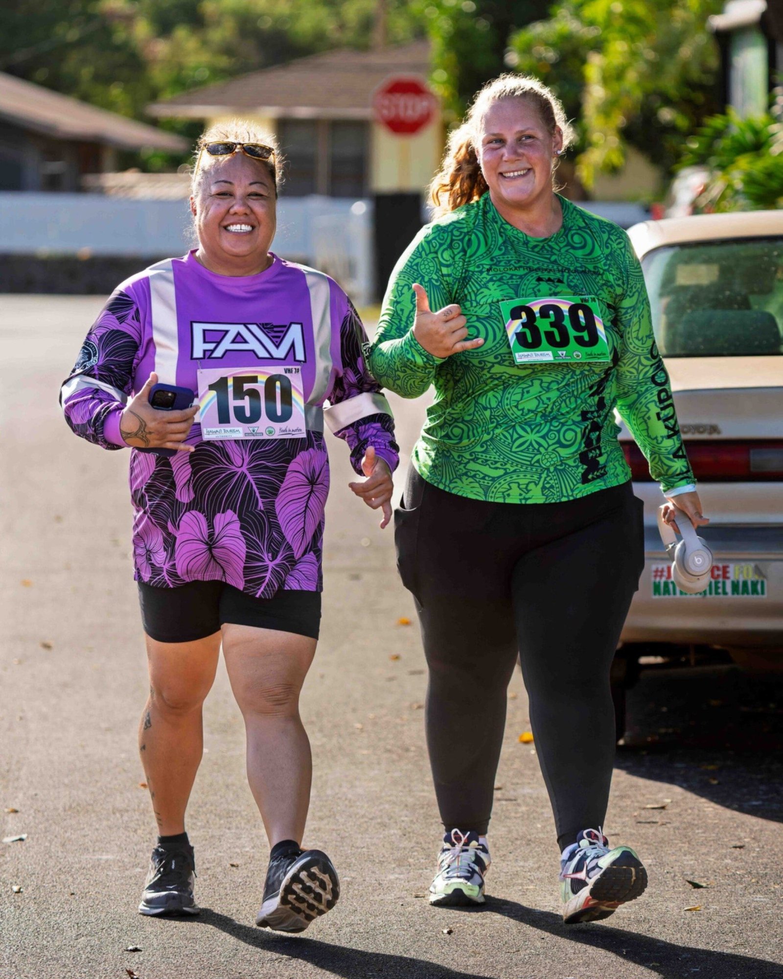 Two community participants smiling