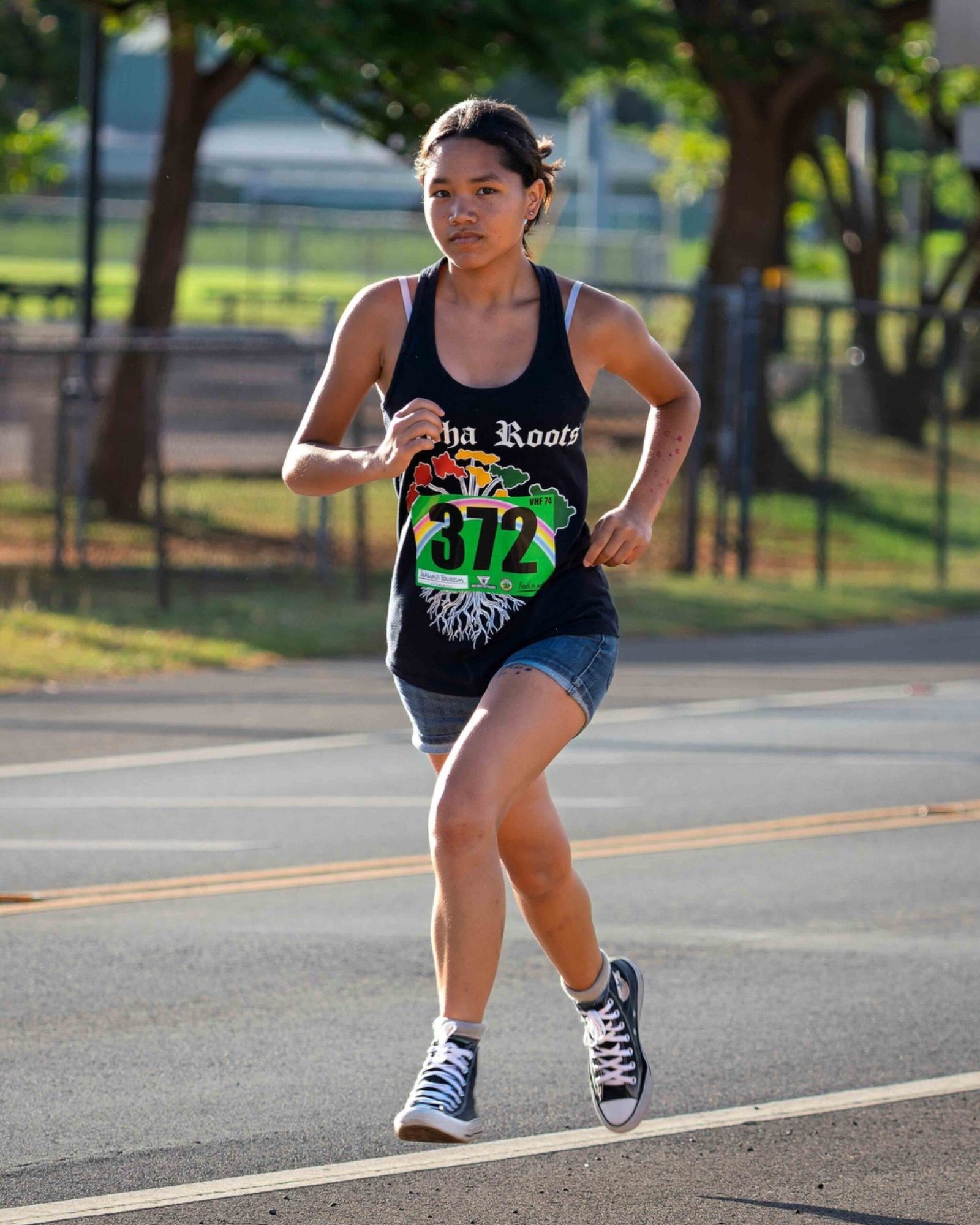 Young runner racing on Molokai